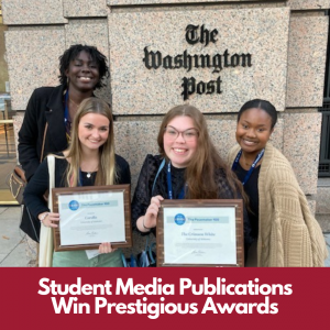 photo of four students posing with an award in front of a sign that reads the washington post